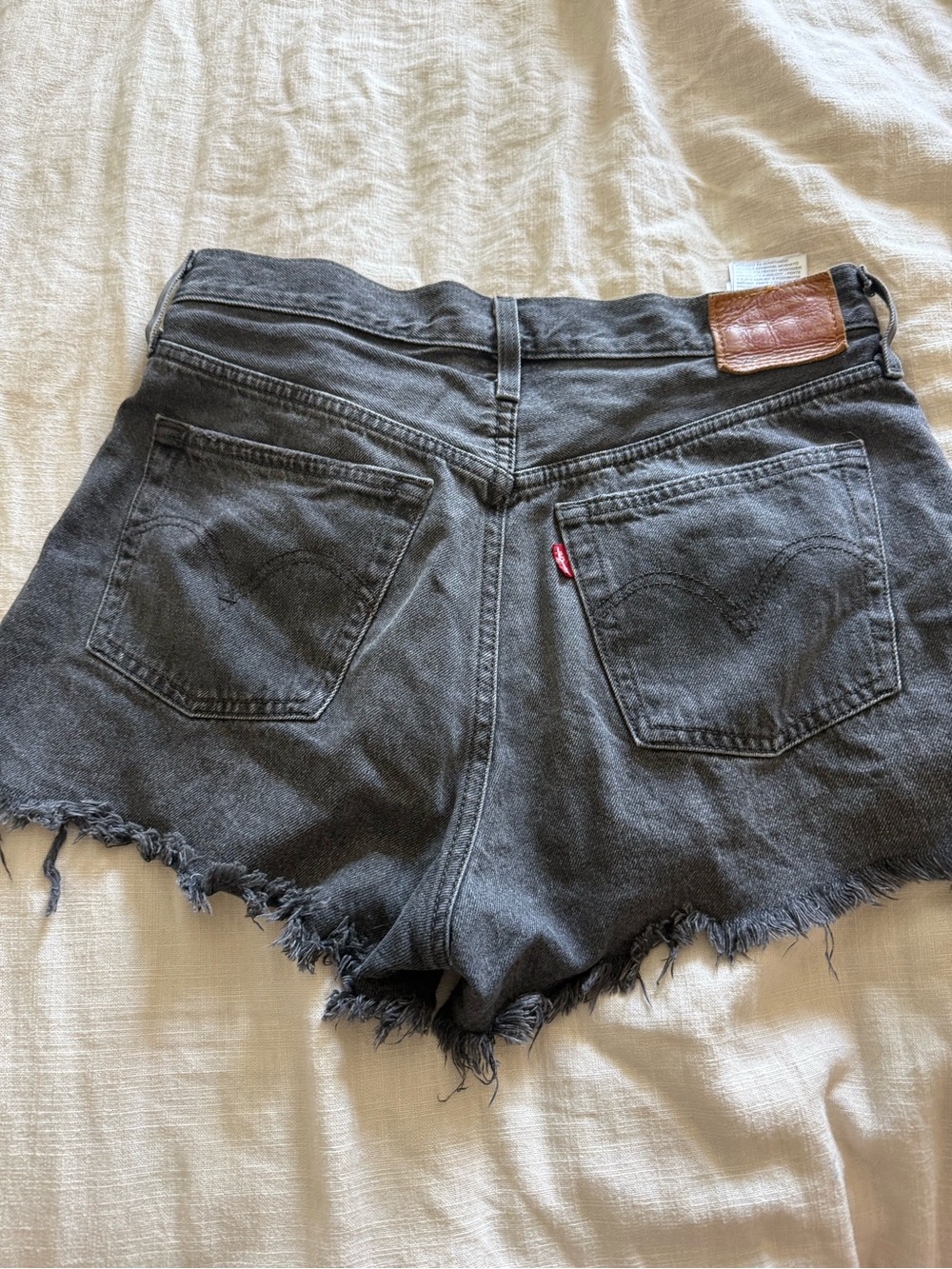 Levi's Black High-Rise Frayed Denim Cutoff Shorts